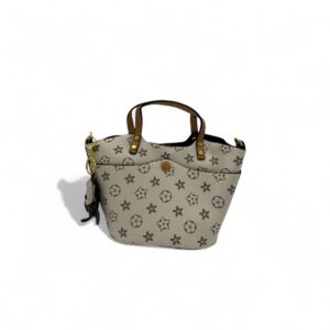 Beige handbag with brown floral and circular patterns, featuring leather handles and a detachable strap.